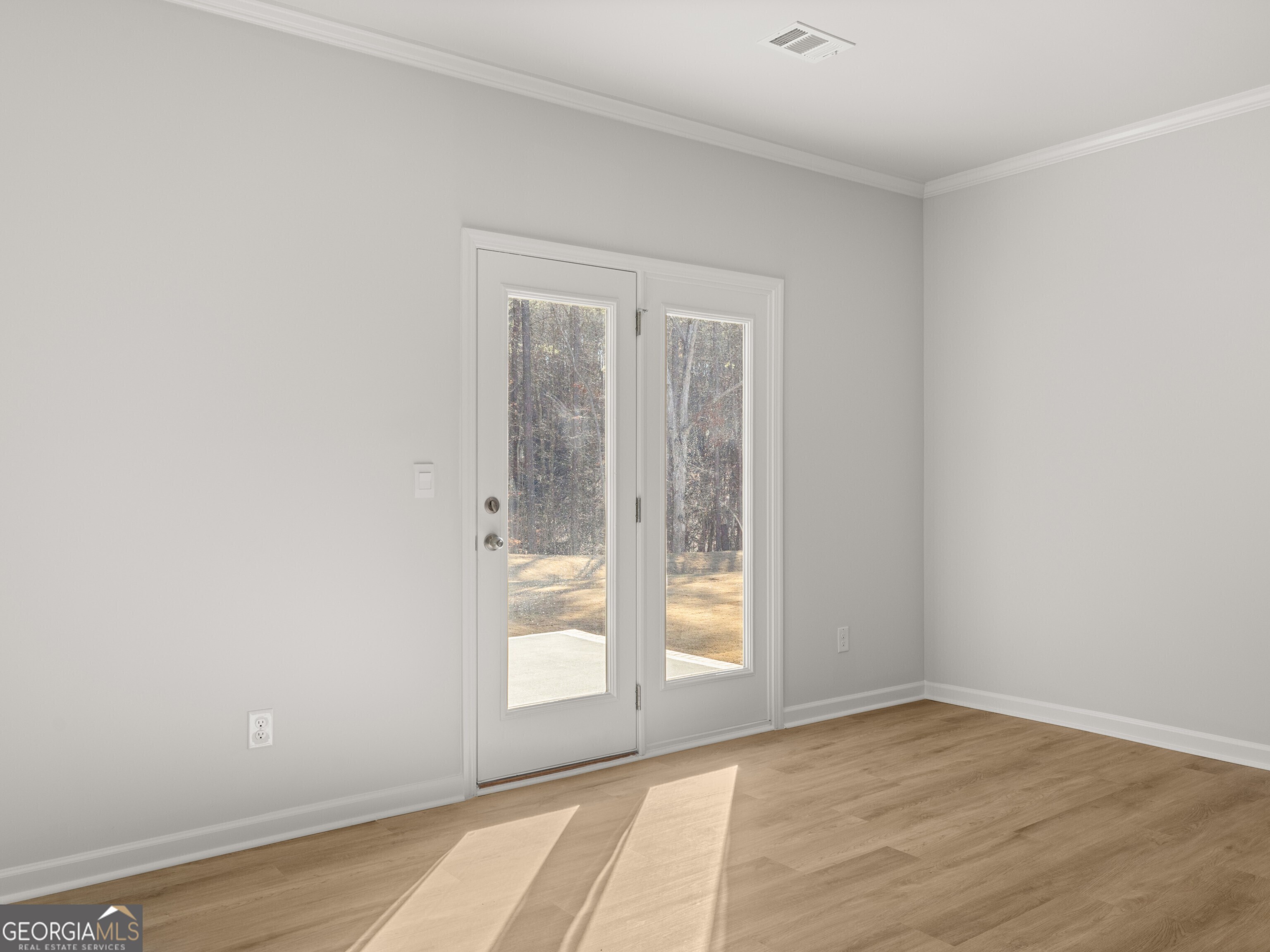 156 Hampton Drive Dallas, GA 30132 - Photo 13 of 81 an empty room with wooden floor and windows