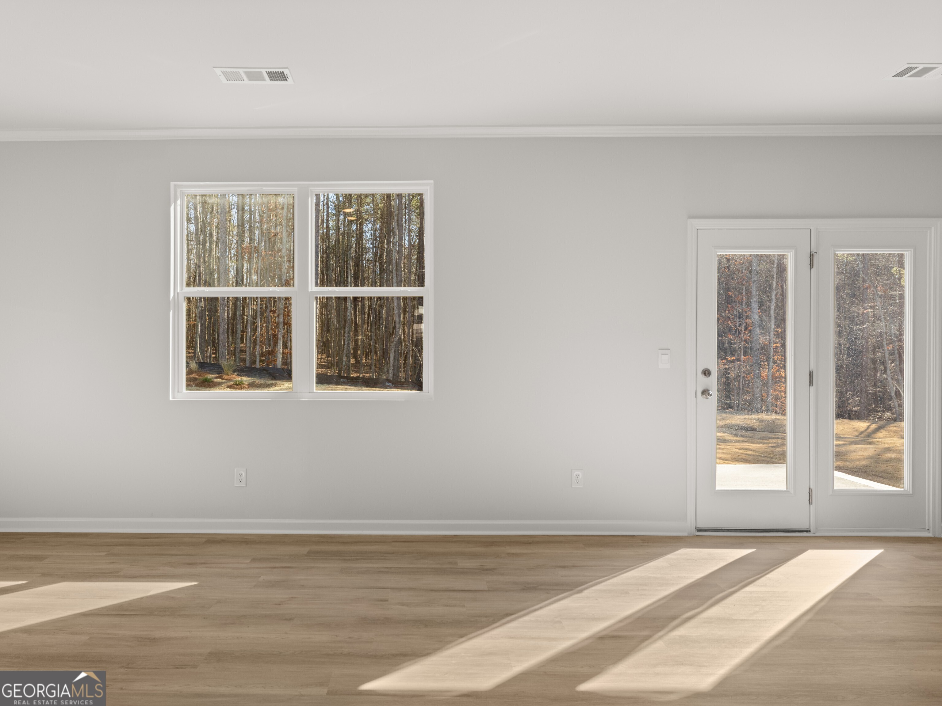 156 Hampton Drive Dallas, GA 30132 - Photo 15 of 81 a view of an empty room with a window