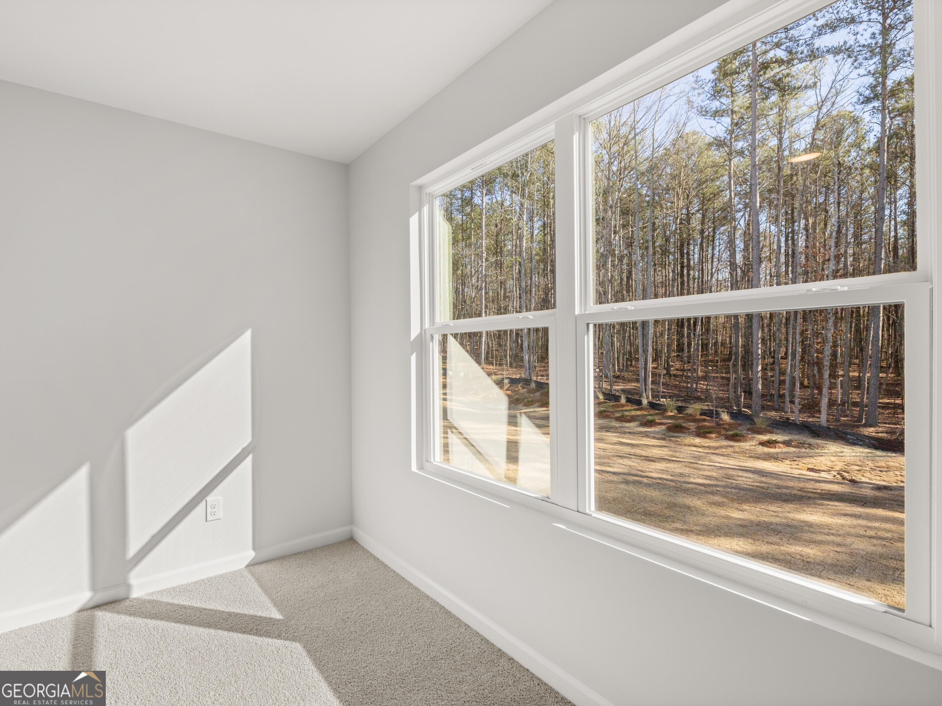 156 Hampton Drive Dallas, GA 30132 - Photo 35 of 81 a view of an empty room with a window