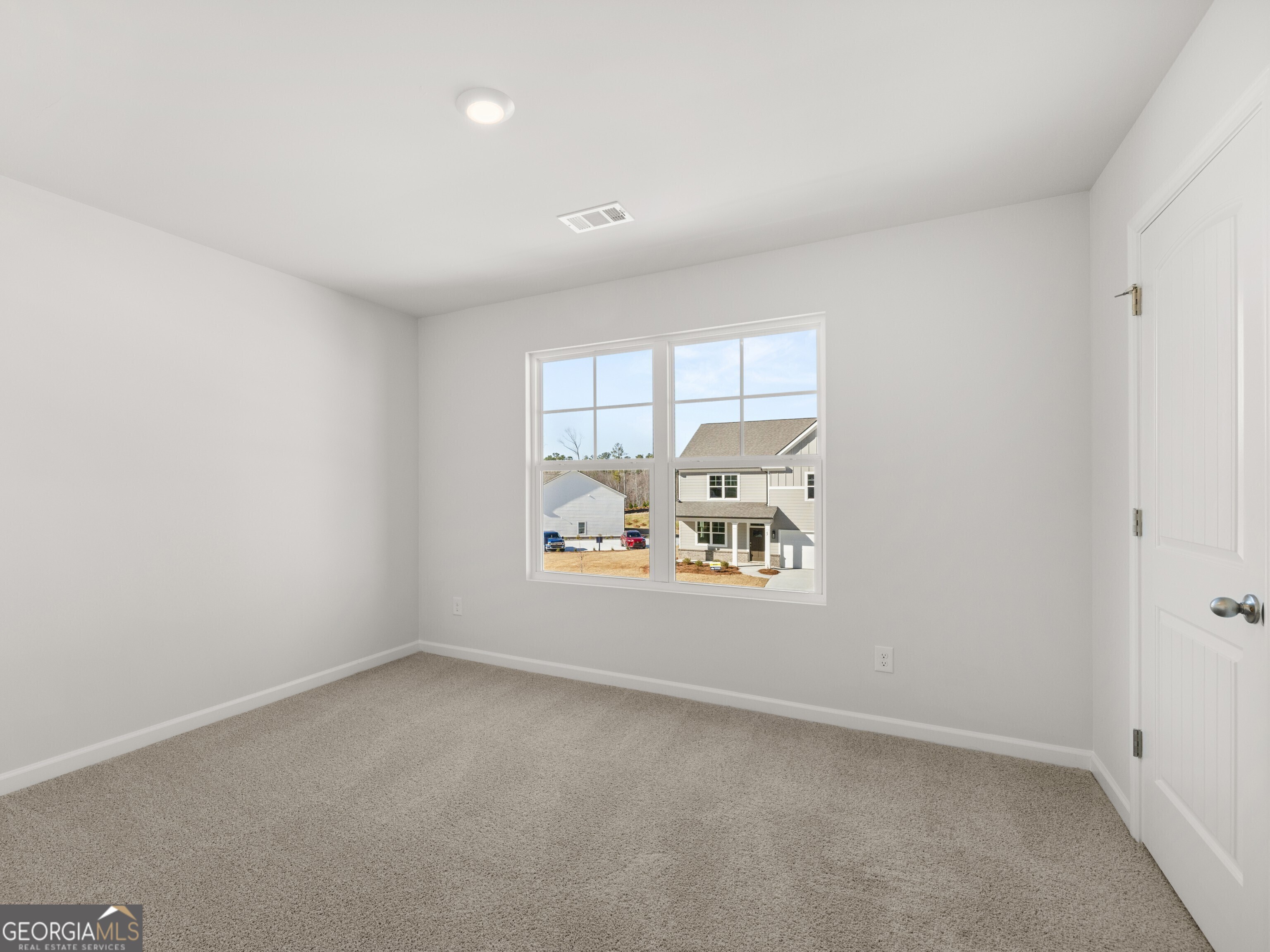 156 Hampton Drive Dallas, GA 30132 - Photo 38 of 81 an empty room with a window