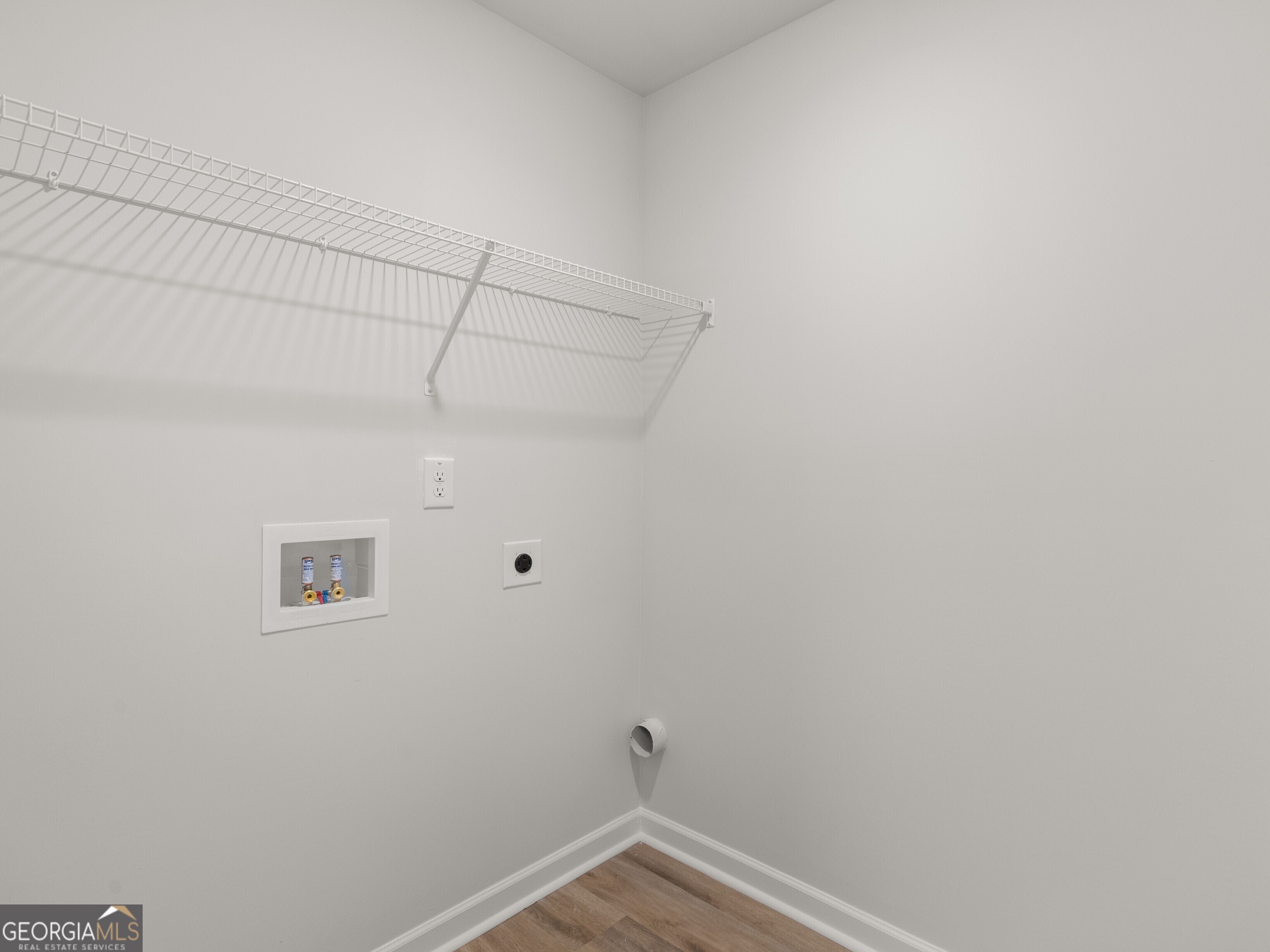 156 Hampton Drive Dallas, GA 30132 - Photo 45 of 81 a view of a room with racks on the wall