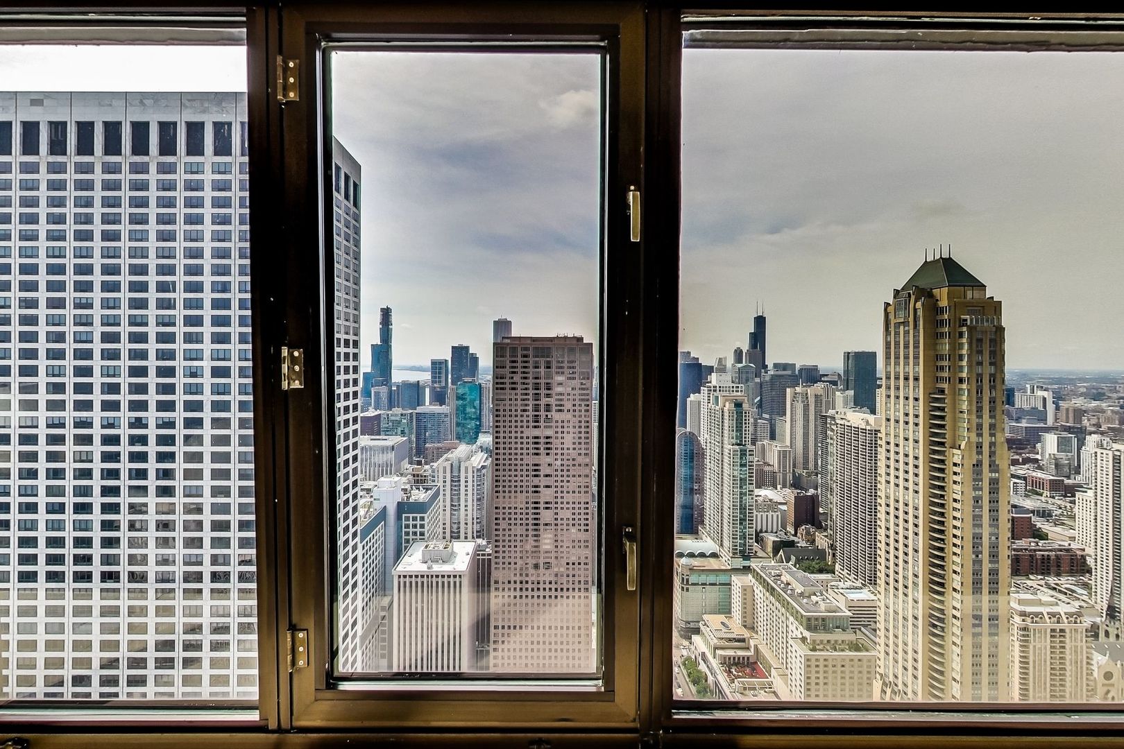 175 East Delaware Place, Unit 5819 Chicago, IL 60611 - Photo 12 of 22 a view of a city from a balcony