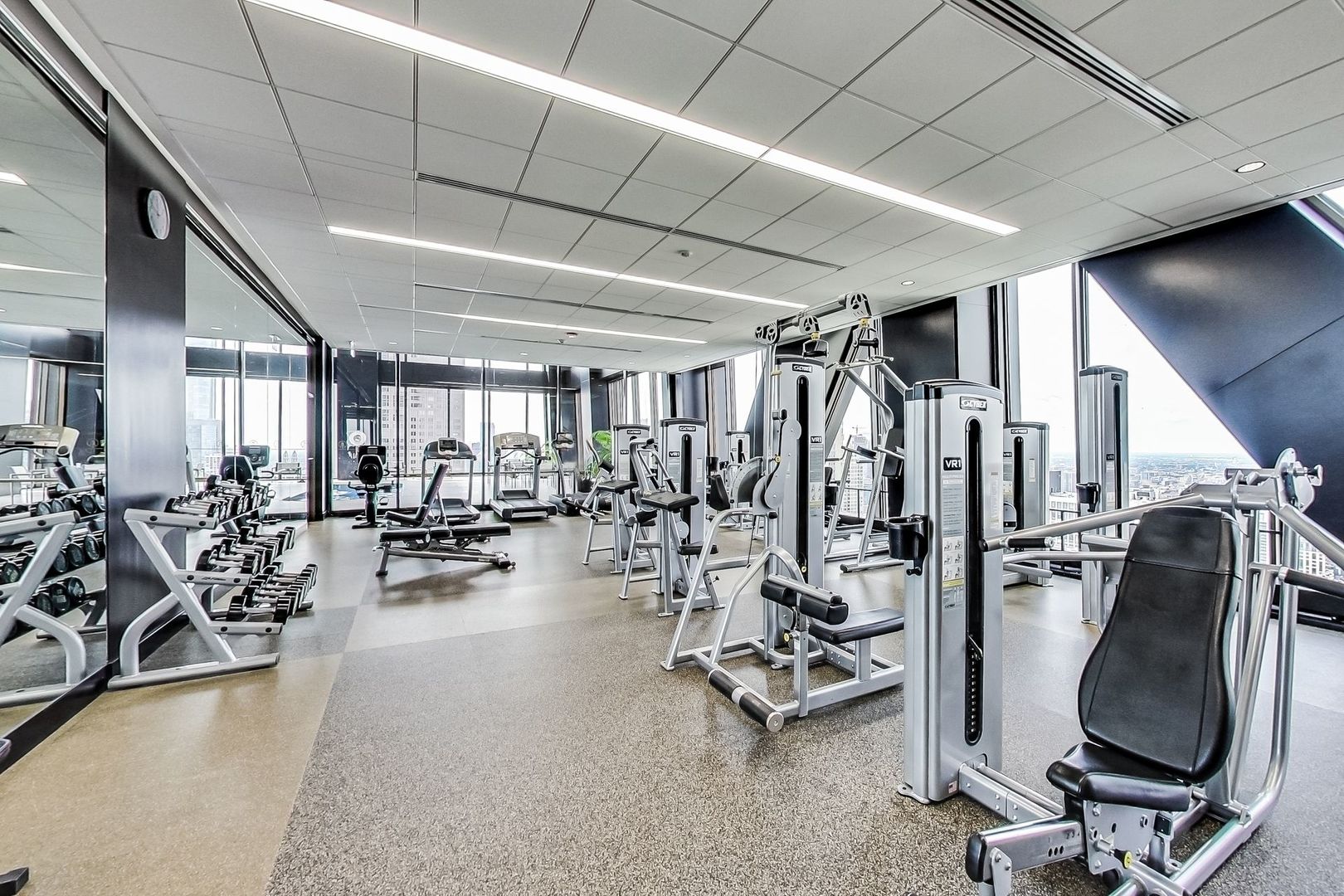 175 East Delaware Place, Unit 5819 Chicago, IL 60611 - Photo 16 of 22 a view of a room with gym equipment