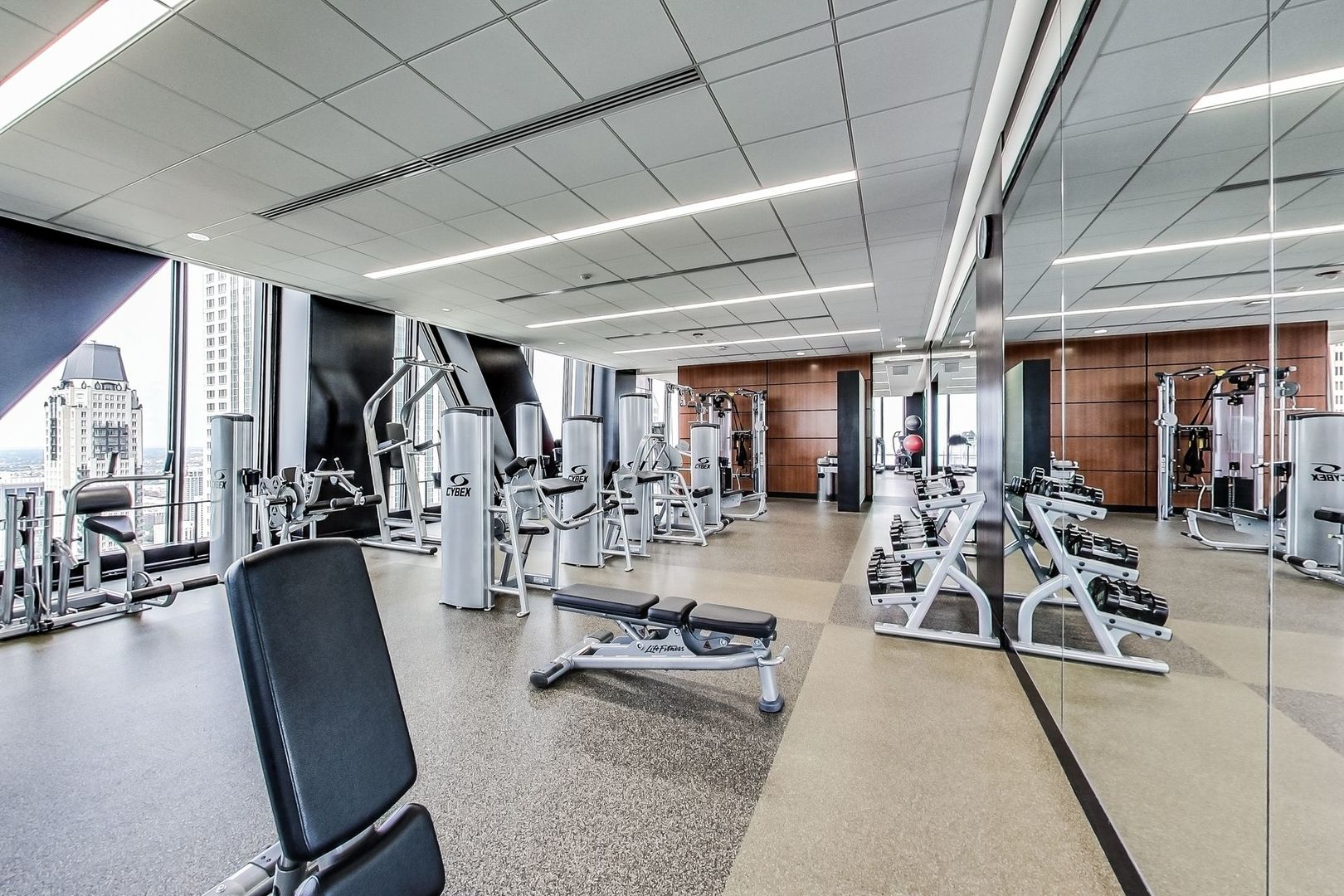 175 East Delaware Place, Unit 5819 Chicago, IL 60611 - Photo 17 of 22 a view of a room with gym equipment