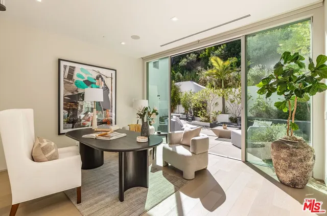 a view of a patio in the backyard