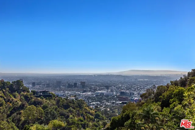 a front view of a house with swimming pool