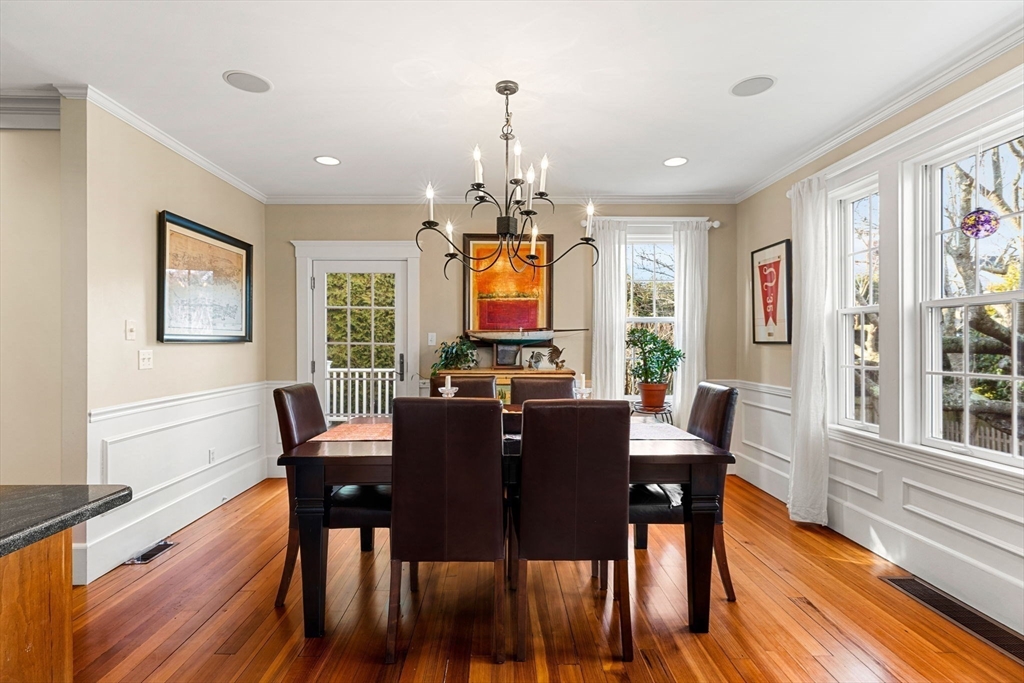 23 Wyman Road Marblehead, MA 01945 - Photo 11 of 42 a view of a dining room with furniture window and wooden floor
