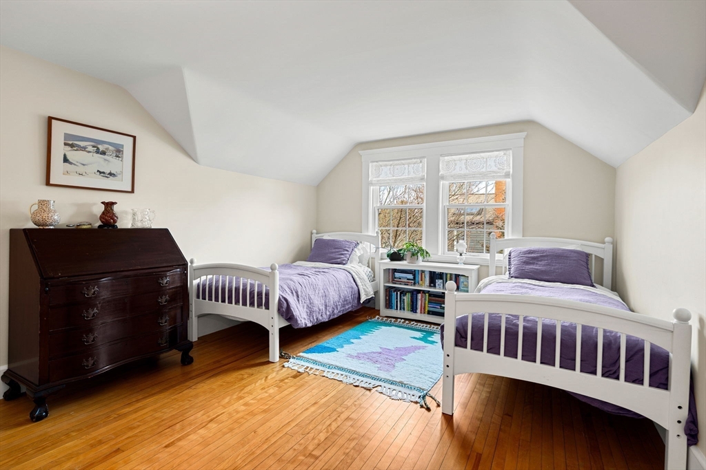 23 Wyman Road Marblehead, MA 01945 - Photo 31 of 42 a bedroom with two beds and a window