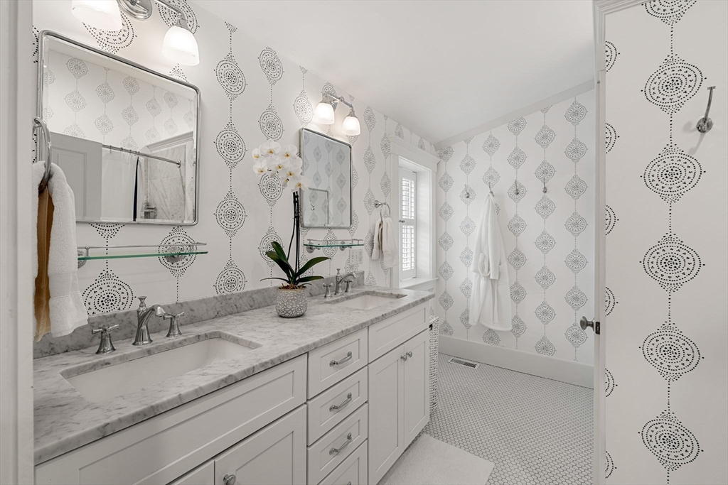 23 Wyman Road Marblehead, MA 01945 - Photo 33 of 42 a bathroom with a granite countertop sink mirror and double