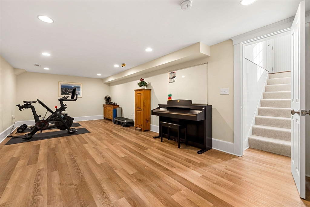 23 Wyman Road Marblehead, MA 01945 - Photo 35 of 42 a view of a room with wooden floor and furniture