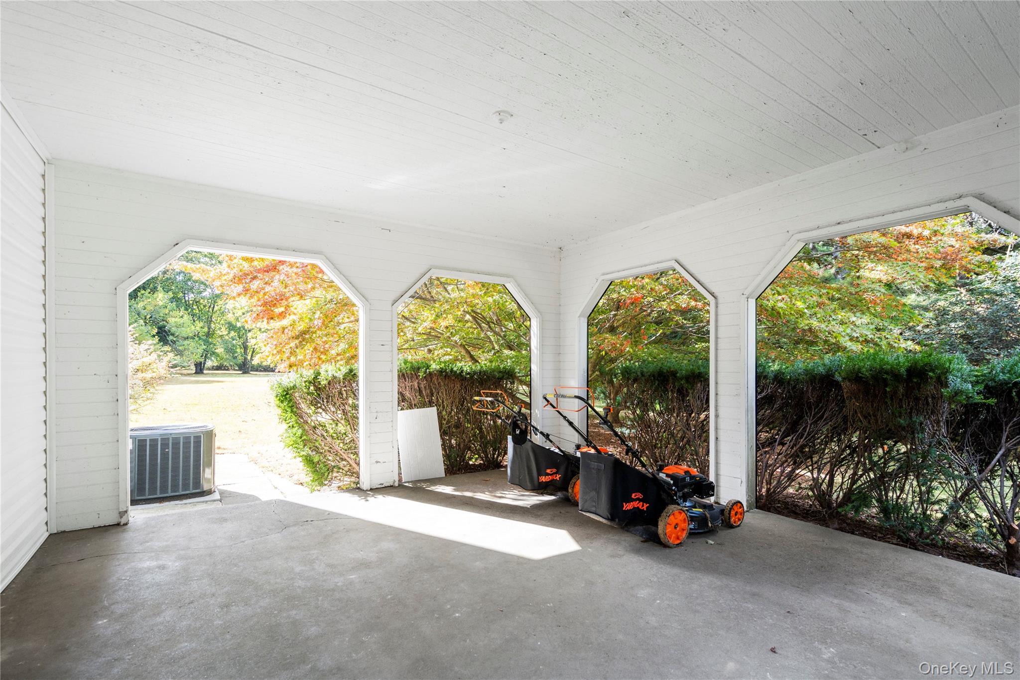 897 Ripley Lane Muttontown, NY 11771 - Photo 13 of 45 French Doors from Living Room that open to Loggia