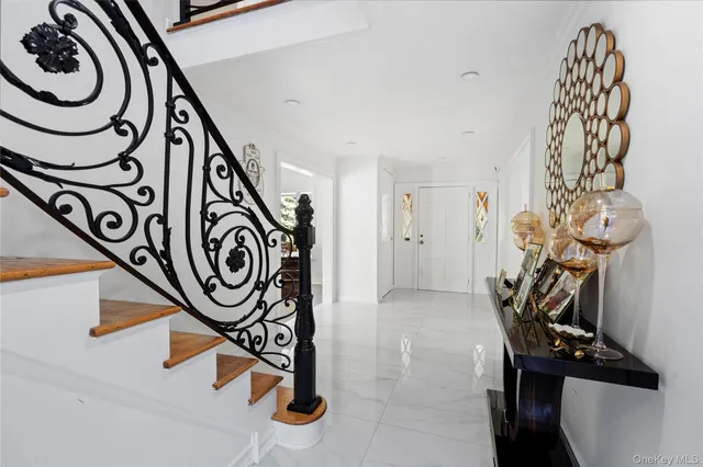 a bedroom with a large bed and a couch