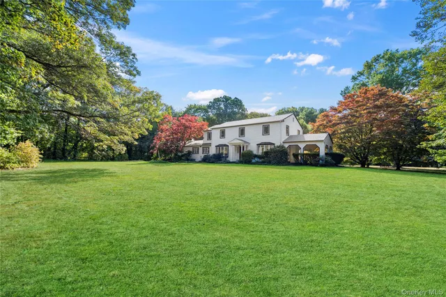 a view of a house with a big yard