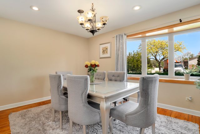 8369 West Kay Street Niles, IL 60714 - Photo 5 of 26 a view of a dining room with furniture window and outside view