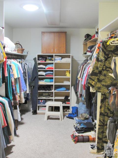 522 Avocado Place Camarillo, CA 93010 - Photo 18 of 30 a view of walk in closet with clothes and shoes