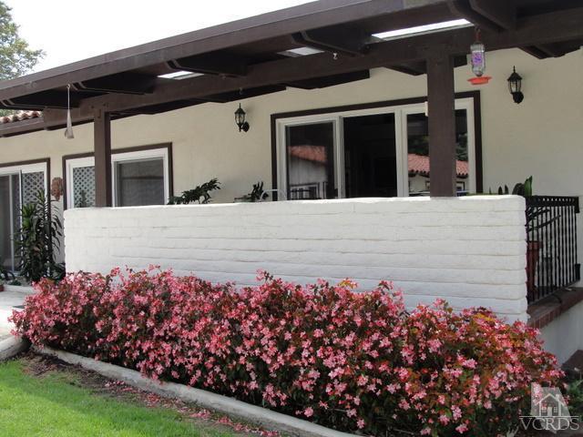 522 Avocado Place Camarillo, CA 93010 - Photo 4 of 30 front view of a house with a yard