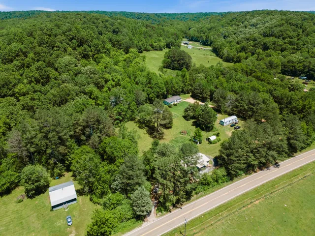 a view of a garden with a building