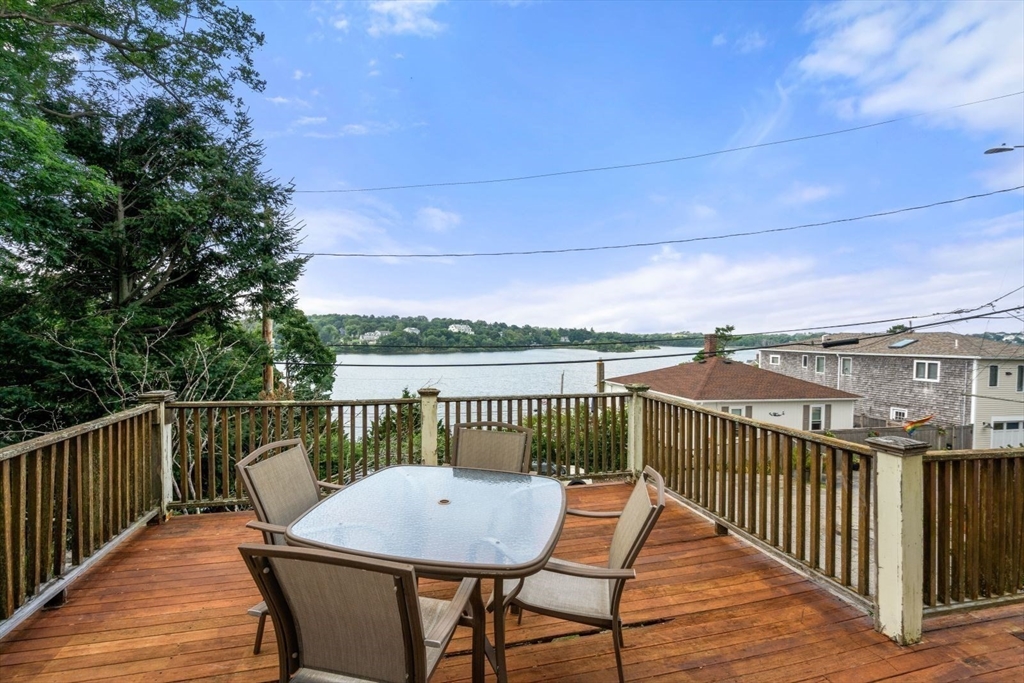 49 Summit Avenue Hull, MA 02045 - Photo 13 of 29 a view of a balcony with wooden floor and outdoor seating