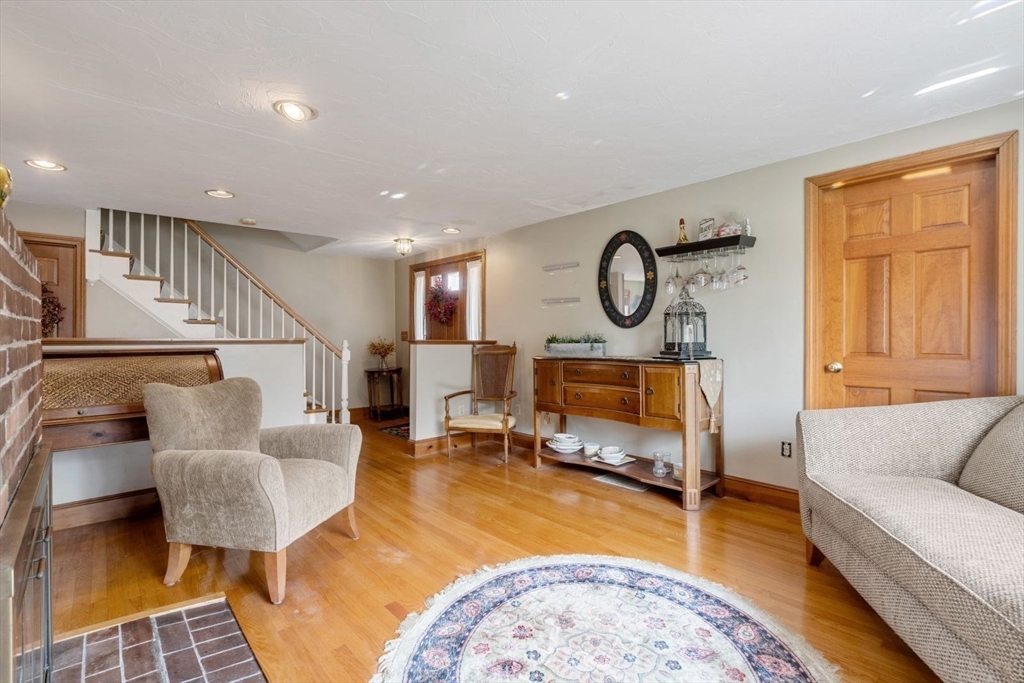 49 Summit Avenue Hull, MA 02045 - Photo 21 of 29 a living room with furniture bathtub and a table
