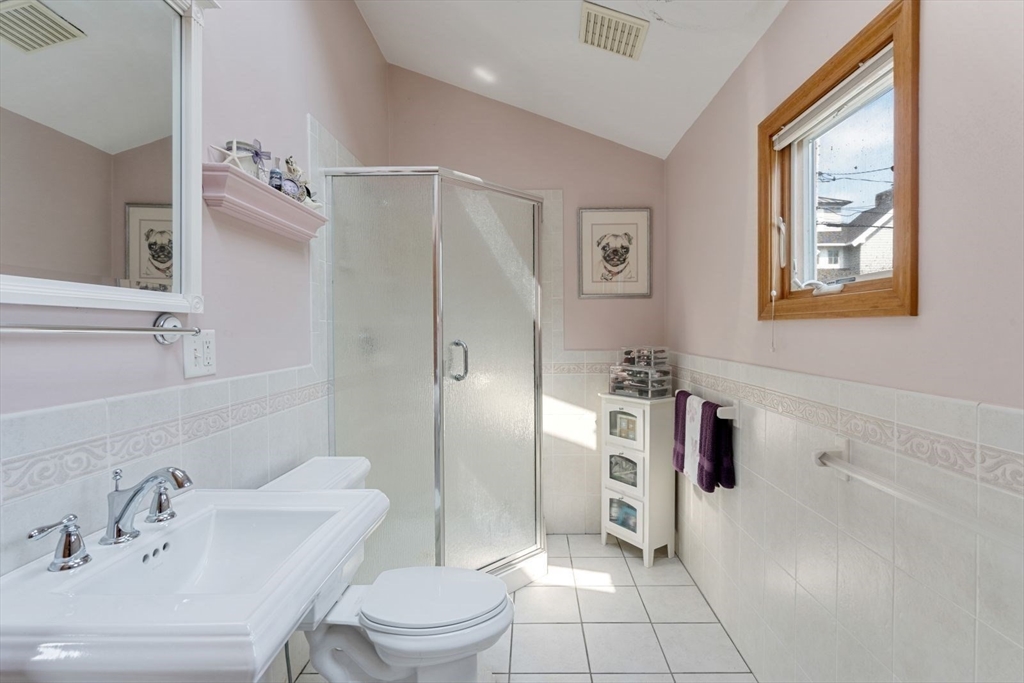 49 Summit Avenue Hull, MA 02045 - Photo 28 of 29 a bathroom with a sink toilet and shower