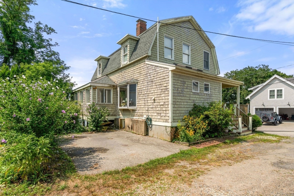 49 Summit Avenue Hull, MA 02045 - Photo 7 of 29 a front view of a house with a yard