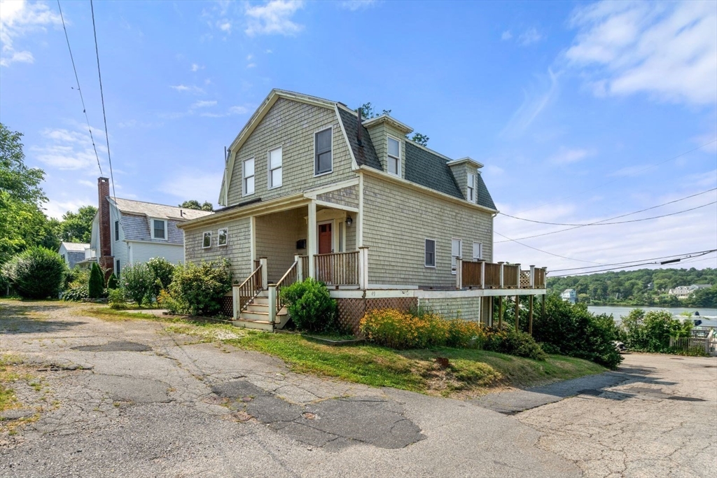 49 Summit Avenue Hull, MA 02045 - Photo 8 of 29 a front view of a house with a yard