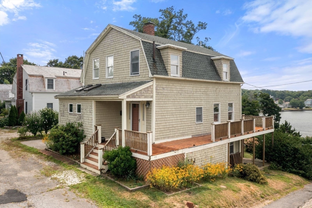 49 Summit Avenue Hull, MA 02045 - Photo 10 of 29 a front view of a house with a yard