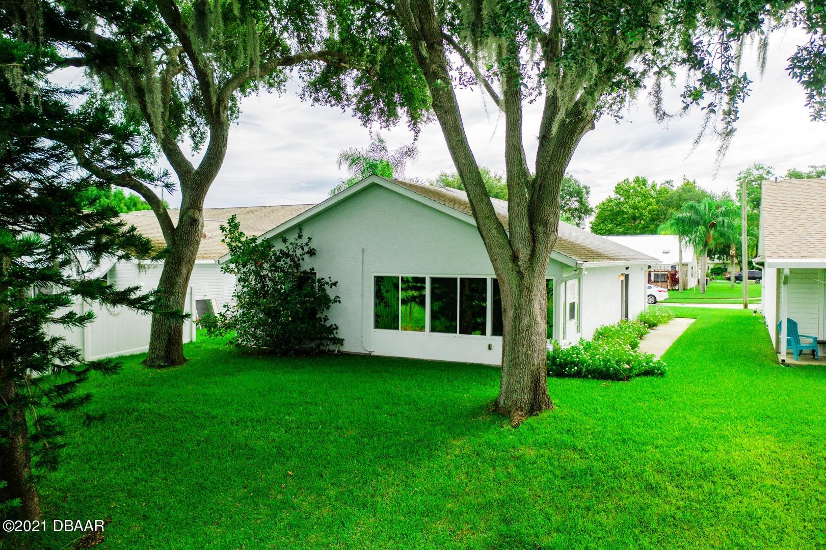 980 Deer Springs Road Port Orange, FL 32129 - Photo 16 of 22 980 DEER SPRINGS ROAD backyard 2