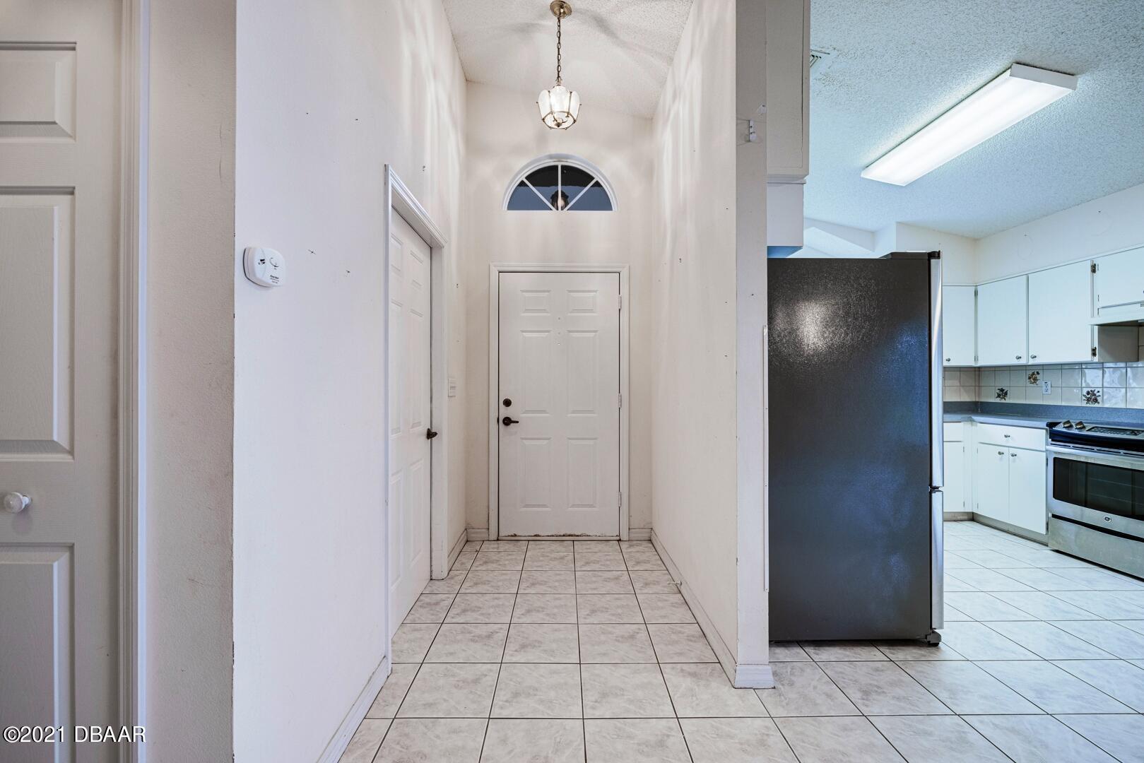 980 Deer Springs Road Port Orange, FL 32129 - Photo 2 of 22 980 DEER SPRINGS ROAD foyer