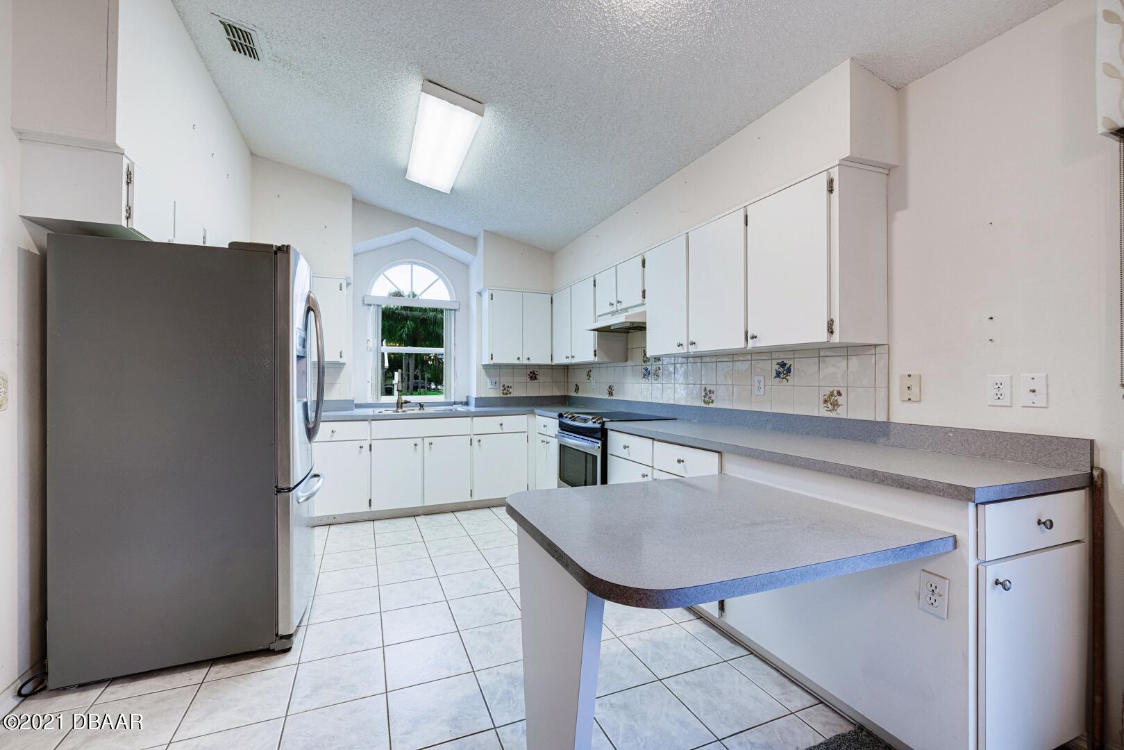 980 Deer Springs Road Port Orange, FL 32129 - Photo 4 of 22 980 DEER SPRINGS ROAD kitchen 2