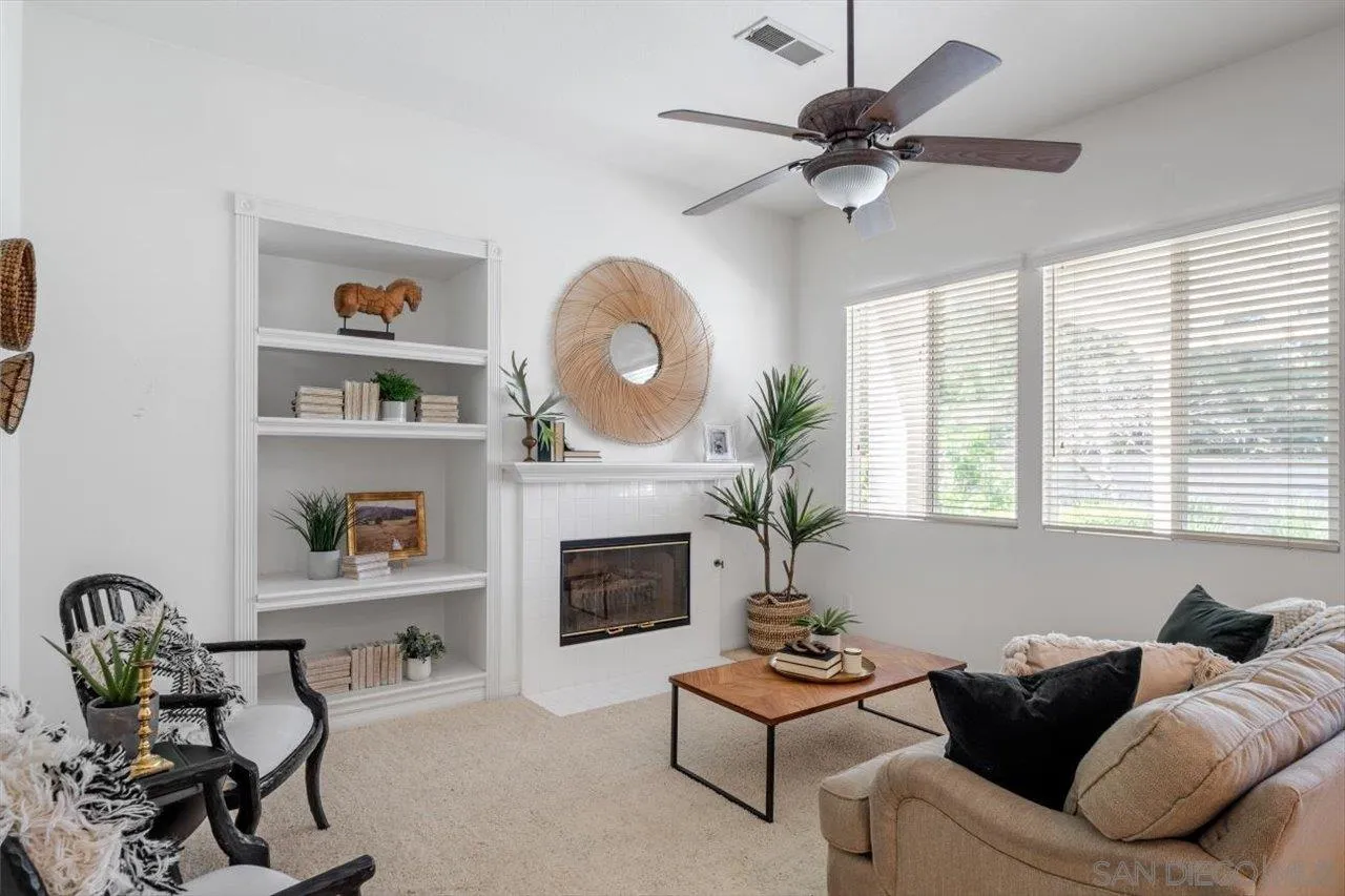 2195 Stone Castle Fallbrook, CA 92028 - Photo 14 of 37 a living room with furniture and a fireplace