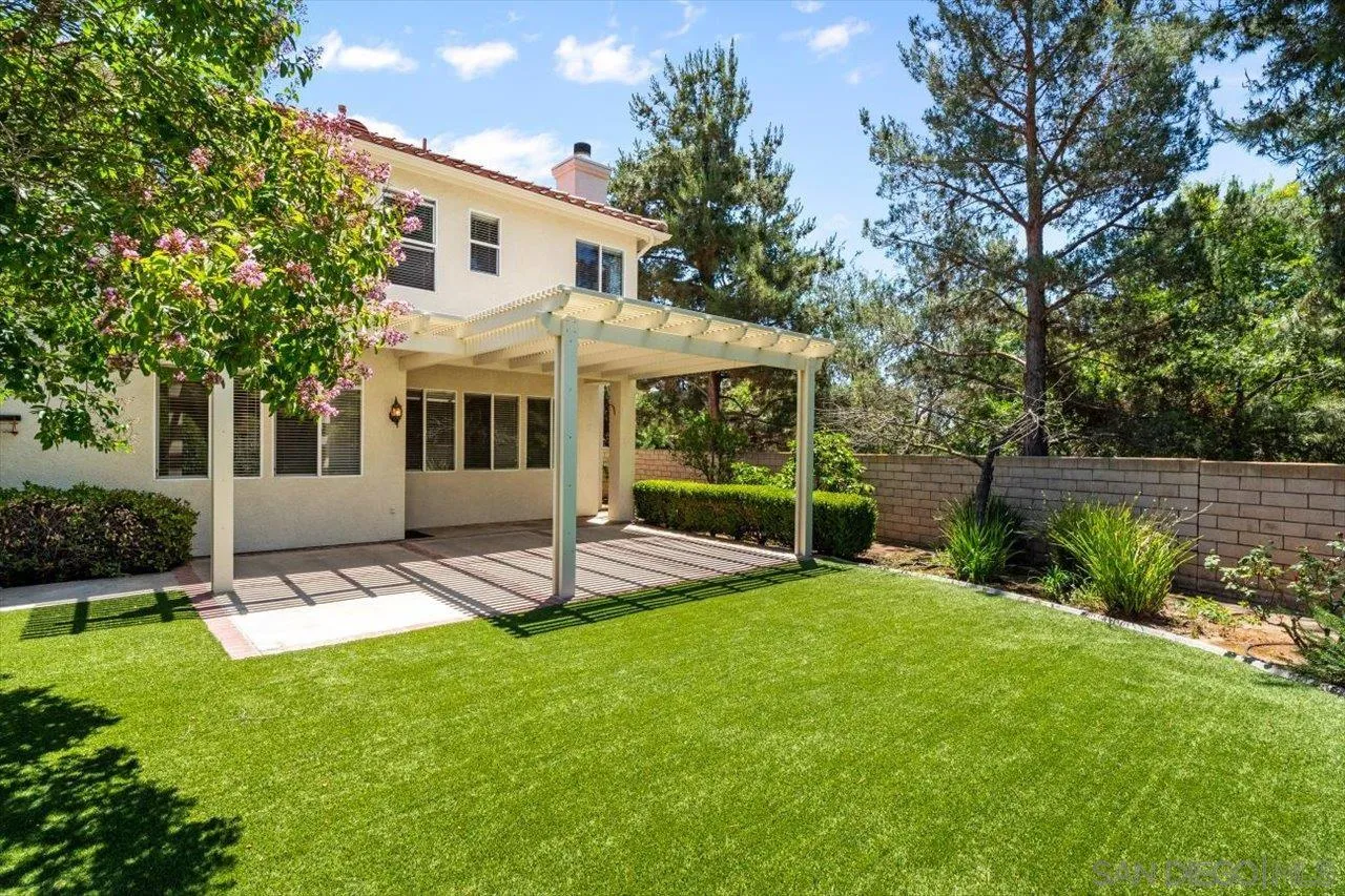 2195 Stone Castle Fallbrook, CA 92028 - Photo 19 of 37 a view of a house with a yard and a patio