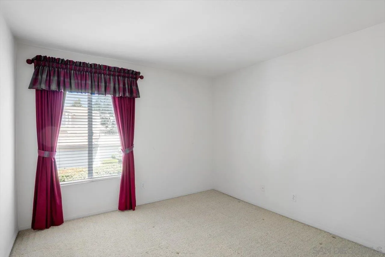 2195 Stone Castle Fallbrook, CA 92028 - Photo 27 of 37 a view of an empty room with a window