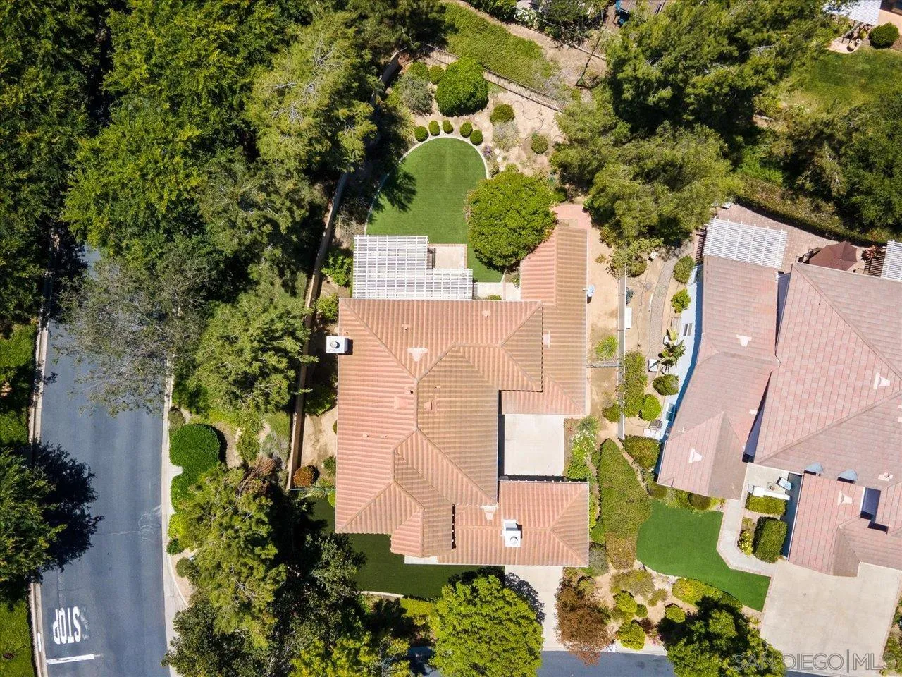 2195 Stone Castle Fallbrook, CA 92028 - Photo 35 of 37 an aerial view of a house with a yard and swimming pool