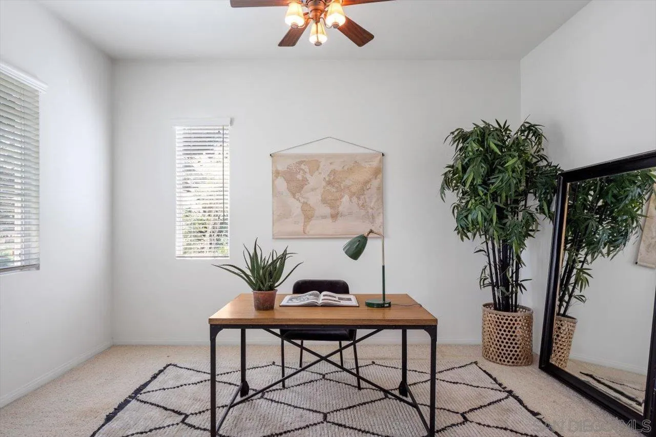 2195 Stone Castle Fallbrook, CA 92028 - Photo 5 of 37 a view of a livingroom with furniture and a potted plant