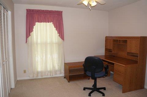 2117 Layton Road Clarksville, TN 37043 - Photo 14 of 20 Third Bedroom is good size at 11 x 11. It also features a extra large closet and a ceiling fan.