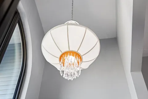 a view of balcony with wooden floor and fence