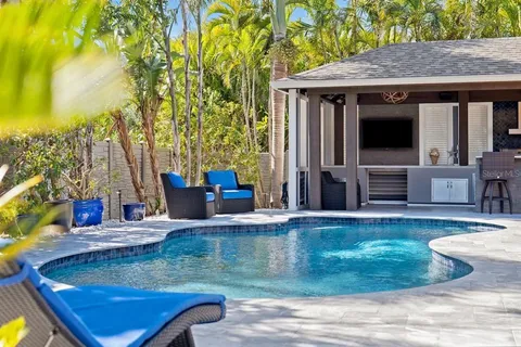 a kitchen with stainless steel appliances granite countertop a stove and a sink