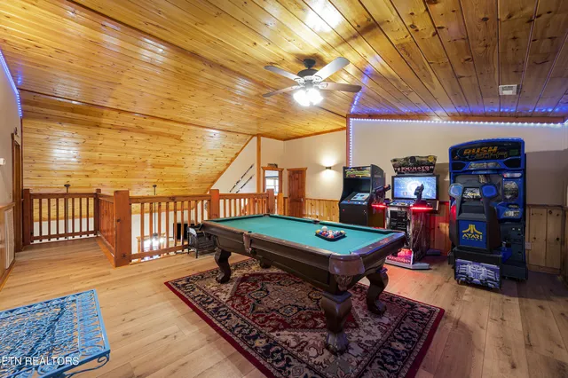 a bedroom with a bed couch and window