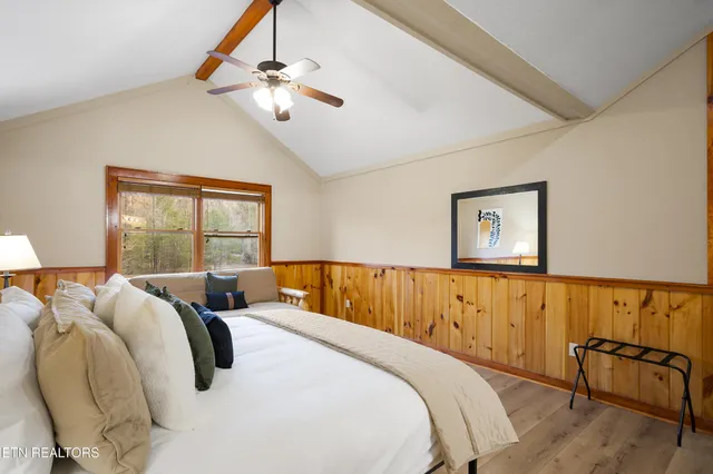 a view of a porch with furniture and a window
