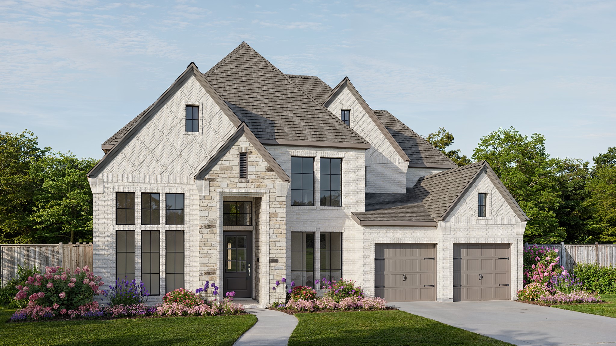6334 King Ranch Loop Manvel, TX 77578 - Photo 1 of 13 a front view of a house with a yard