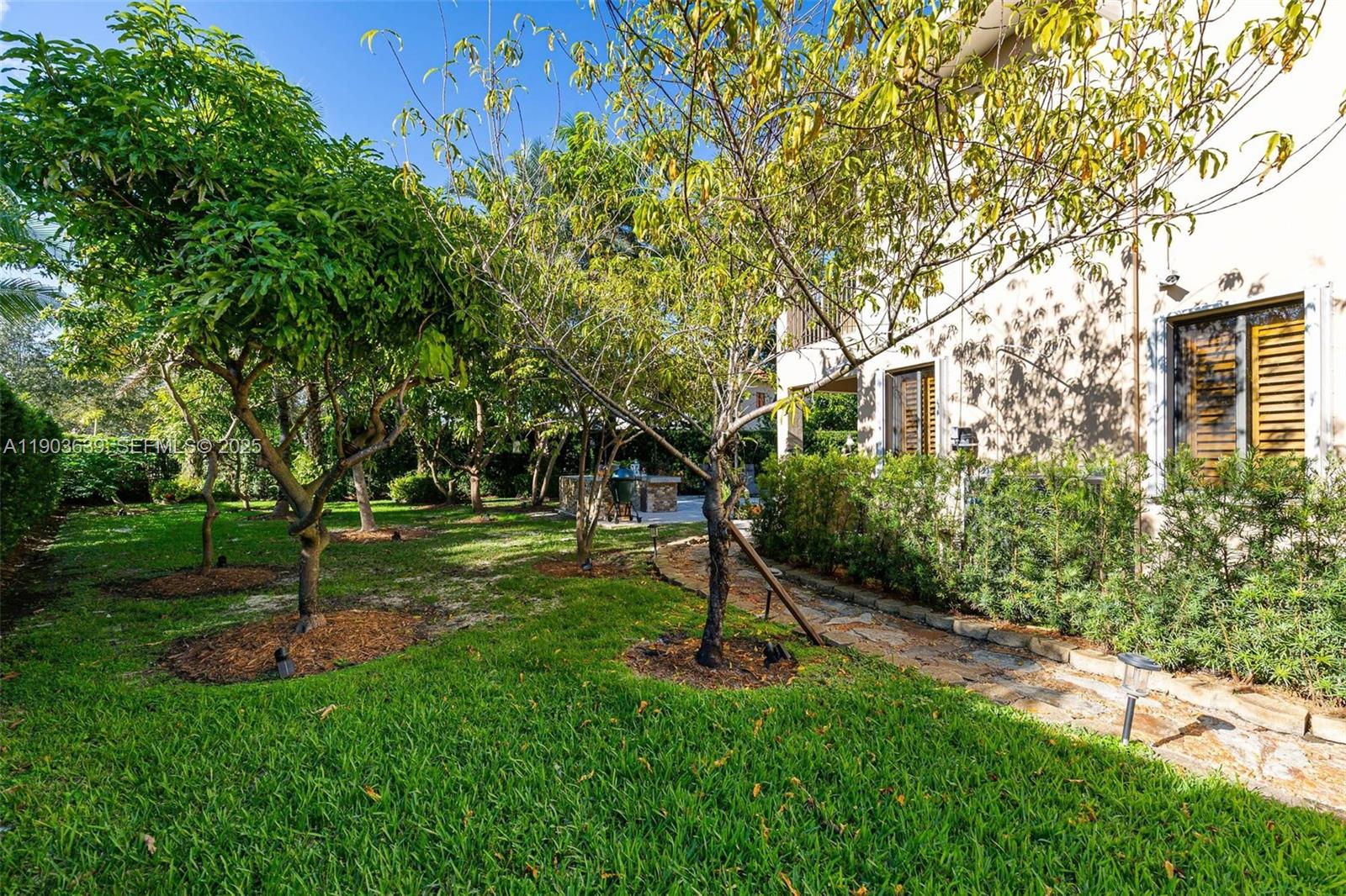 7587 Southwest 189th Street Cutler Bay, FL 33157 - Photo 12 of 66 a view of a park with a tree