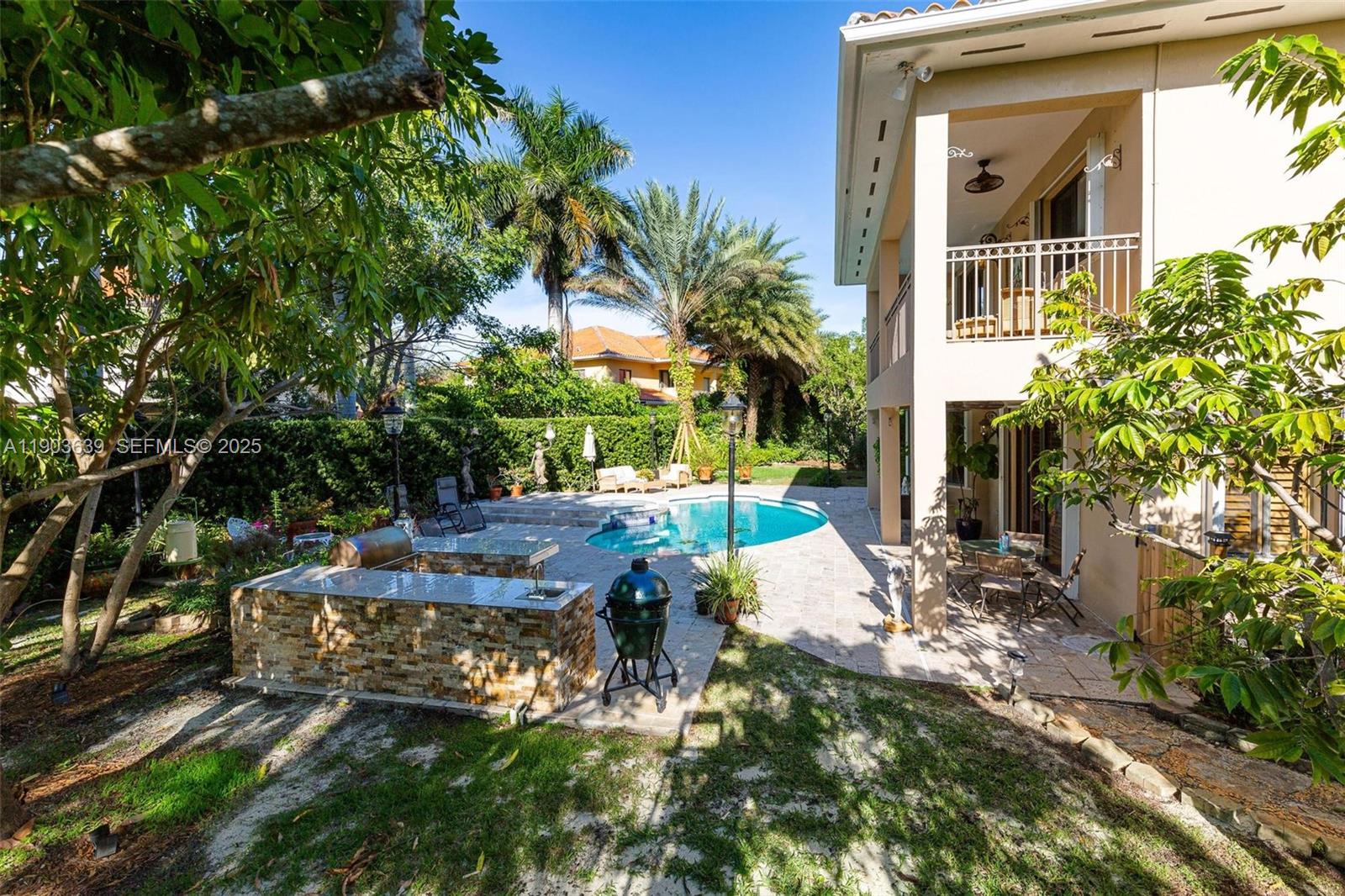 7587 Southwest 189th Street Cutler Bay, FL 33157 - Photo 13 of 66 a view of a house with backyard and sitting area