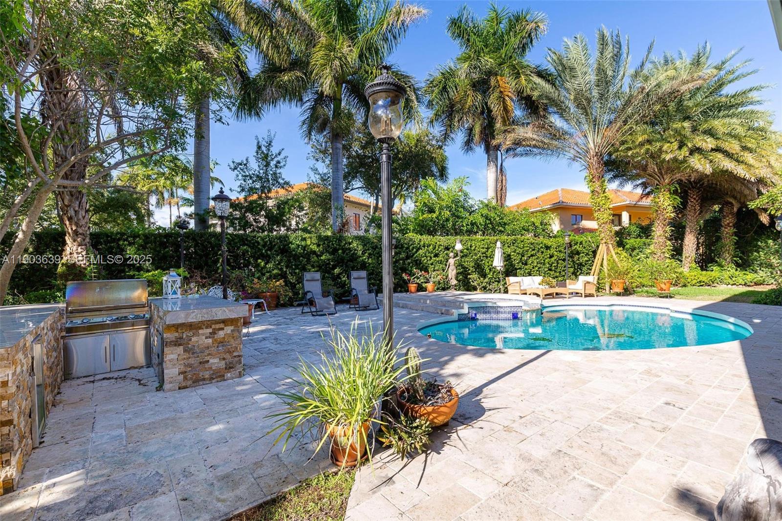 7587 Southwest 189th Street Cutler Bay, FL 33157 - Photo 14 of 66 a view of a backyard with plants
