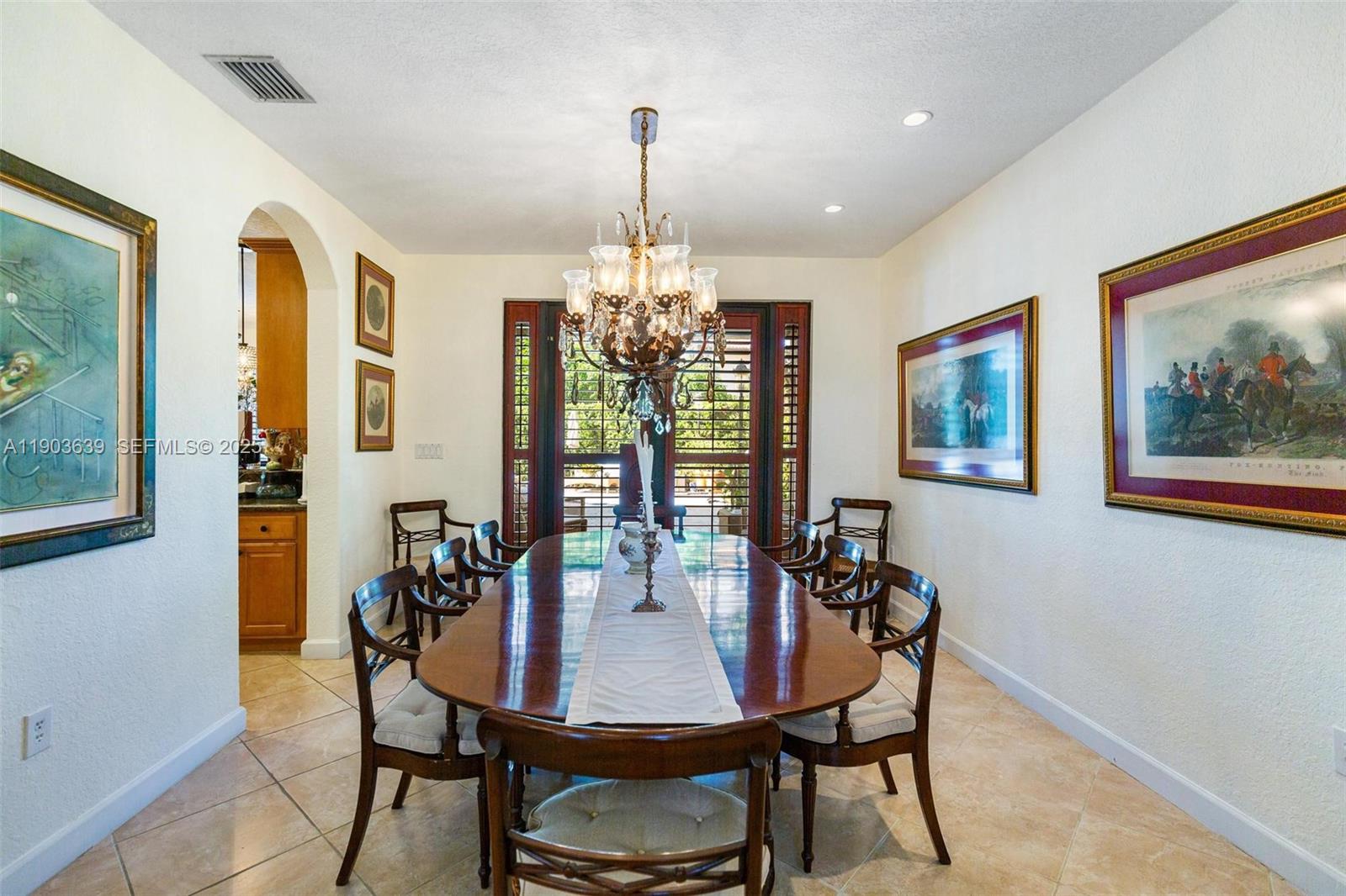 7587 Southwest 189th Street Cutler Bay, FL 33157 - Photo 17 of 66 a view of a dining room with furniture window and outside view