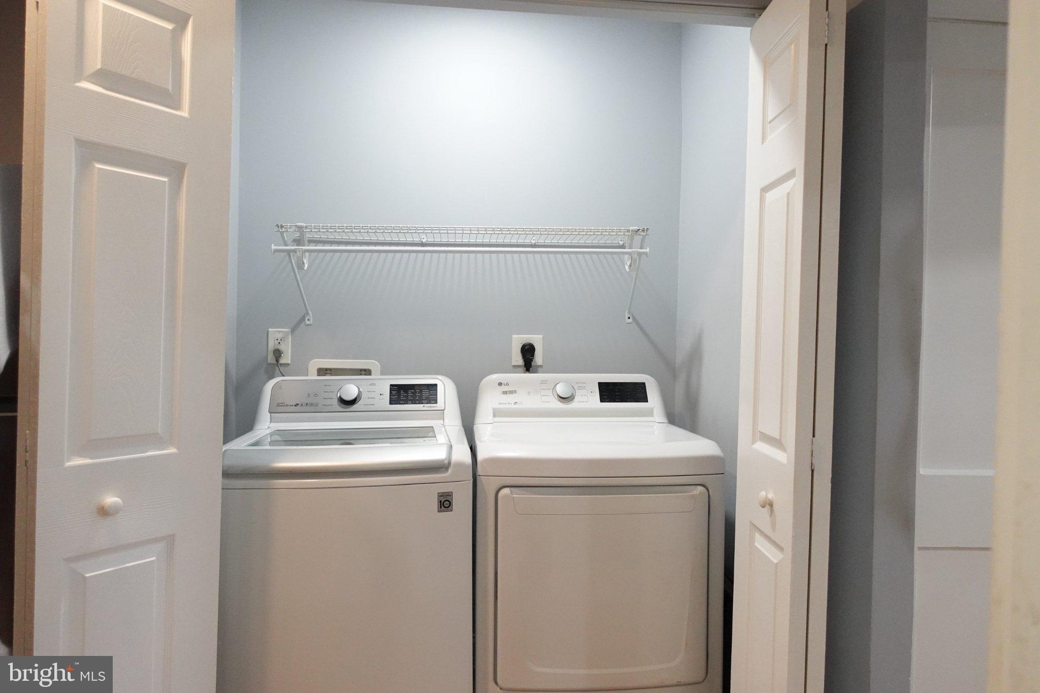1228 18th Street Northeast Washington, DC 20002 - Photo 11 of 11 a utility room with dryer and washer