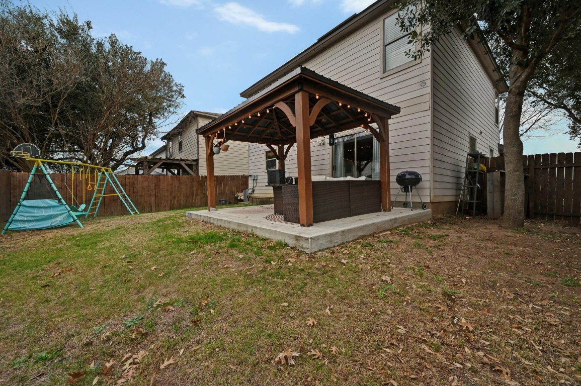6624 Quinton Drive Austin, TX 78747 - Photo 25 of 25 a view of a house with a yard