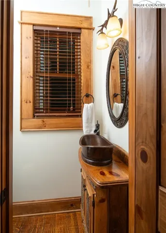 a utility room with sink dryer and washer