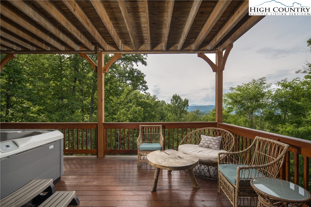 153 Stonecrop Lane Boone, NC 28607 - Photo 26 of 49 a view of balcony with wooden floor and outdoor seating
