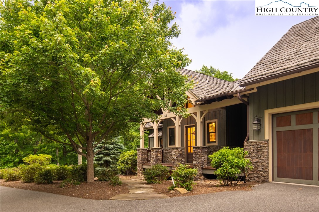153 Stonecrop Lane Boone, NC 28607 - Photo 43 of 49 a front view of a house with a yard